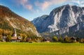 Amazing Alpine valley in Austrian Alps at Sunny day. Incredible Autumn Landscape with famous Lake Altausseer See, and Trisselwand Royalty Free Stock Photo