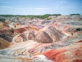 Amazing  apocalyptic landscape like a planet Mars surface. Solidified red-brown black Earth surface. Barren, cracked and scorched Royalty Free Stock Photo