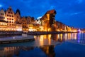 Amazing architecture of Gdansk old town over the Motlawa River at night Royalty Free Stock Photo