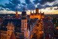 Amazing architecture of the main city in Gdansk at sunset, Poland. Aerial view of the Long Market, Main Town Hall and St. Mary