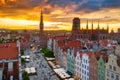 Amazing architecture of the main city in Gdansk at sunset, Poland. Aerial view of the Long Market, Main Town Hall and St. Mary Royalty Free Stock Photo