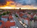 Amazing architecture of the main city in Gdansk at sunset, Poland. Aerial view of the Long Market, Main Town Hall and St. Mary Royalty Free Stock Photo