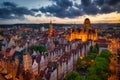 Amazing architecture of the main city in Gdansk at sunset, Poland. Aerial view of the Long Market, Main Town Hall and St. Mary Royalty Free Stock Photo