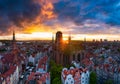 Amazing architecture of the main city in Gdansk at sunset, Poland. Aerial view of the St. Mary Basilica and  Main Town Hall Royalty Free Stock Photo