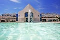 Amazing architecture of modern building next to pond with fountain Royalty Free Stock Photo