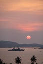 Amazing asian sunset with warship