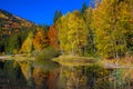 Amazing autumn landscape with Saint Ana lake and colorful forest Royalty Free Stock Photo