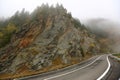 Amazing autumn morning view of foggy Transfagarasan road in Transylvania, Romania Royalty Free Stock Photo