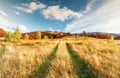 An amazing autumn panorama with a picturesque sky. Colorful autumn sunset in the Carpathians, Ukraine, Europe. Royalty Free Stock Photo