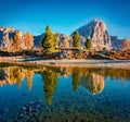 Amazing autumn scene of Limides Lake and Lagazuoi mountain. Sunny morning view of Dolomite Alps, Falzarego pass, Cortina d`Ampezz Royalty Free Stock Photo