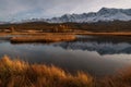 Mountains lake island sunset reflection trees autumn Royalty Free Stock Photo