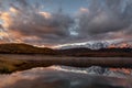 Sunset lake mountains reflection clouds autumn Royalty Free Stock Photo