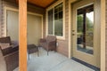 Amazing balcony patio with fire pit and forest and mountains view. Dream come true home exterior. New AMerican architecture. Royalty Free Stock Photo