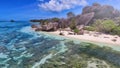 Amazing beach of Anse Source Argent in La Digue, Seychelles from drone