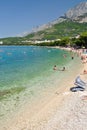 Amazing beach with people in Tucepi, Croatia Royalty Free Stock Photo