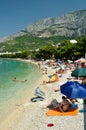 Amazing beach with people in Tucepi, Croatia Royalty Free Stock Photo