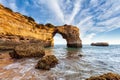 Amazing beach at sunrise. Algarve is located in the south of Portugal and is a vacation destination for many tourists. Your stone Royalty Free Stock Photo