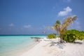 Amazing beach, yellow beach umbrella, blue sky, concept of paradise, perfect gateway vacation. Royalty Free Stock Photo