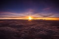 Amazing and beautiful sunset above the clouds with dramatic clouds Royalty Free Stock Photo