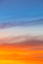 Amazing blue, orange and yellow colors sunset sky gradient vertical background Royalty Free Stock Photo