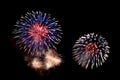 Amazing blue, white and red fireworks on dark background Royalty Free Stock Photo