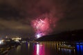 Amazing bright golden and purple firework celebration of the new year 2015 in Prague with the historic city in the background Royalty Free Stock Photo