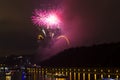 Amazing bright yellow and pink firework celebration of the new year 2015 in Prague with the historic city in the background Royalty Free Stock Photo