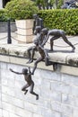 Amazing bronze statues by Chong Fah Cheong of children jumping into the Singapore River