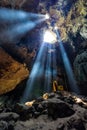 Amazing Buddhism with the ray of light in the cave, Ratchaburi P Royalty Free Stock Photo