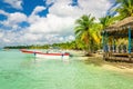 Amazing Caribbean coast with moored motorboat, Dominican Republic