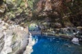 Amazing cave, pool, natural auditorium, salty lake designed by Cesar Manrique in volcanic tunnel called Jameos del Agua in Royalty Free Stock Photo