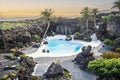 Amazing cave, pool, natural auditorium, salty lake designed by Cesar Manrique in volcanic tunnel called Jameos del Agua in Royalty Free Stock Photo