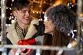 Amazing charming young couple, looking each others in the eyes, Valentines day