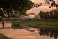 Amazing city view of Uzhhorod at sunset, scenic summer cityscape of old european town on the river Uzh, Zakarpattia, Ukraine