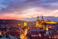 Amazing cityscape view of Prague Castle and church of our Lady Tyn, Czech Republic during sunset time. View from powder tower. Royalty Free Stock Photo