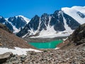 Amazing clear blue mountain lake in the Aktru Valley in Altai. Blue mountain lake on background of mountains. Atmospheric bright Royalty Free Stock Photo