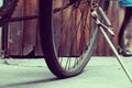 Amazing close up old bicycle front of antique house in vintage tone Royalty Free Stock Photo