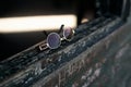 Amazing close up picture of a stylish brown and gold pair of sunglasses