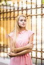 Amazing close up sunny sensual portrait of stunning elegant glamour woman, posing at Europe street, sunny evening colors. Royalty Free Stock Photo