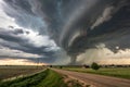Amazing clouds over the landscape of the American Mid-West as supercell thunderstorms develop. Huge tornado on the ground, Royalty Free Stock Photo