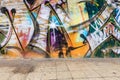 An amazing colorful street graffiti background. Painted cement texture. A wall covered with graffiti. Royalty Free Stock Photo