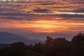 Amazing colorful sunrise sky over the rainforest mountains at Ob Luang natinoal park, Chiangmai, Thailand Royalty Free Stock Photo