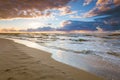 Beatiful sunset with clouds over sea and beach Royalty Free Stock Photo