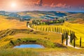 Autumn Tuscany landscape with curved road and cypress, Italy, Europe