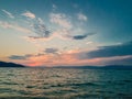 Amazing colourful dramatic sky with clouds, blue and red orange before sunset in Greece Royalty Free Stock Photo