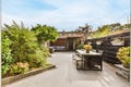 Amazing courtyard design with wooden bench