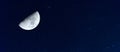 Amazing crescent moon on deep blue night sky background, nebula and galaxies with noise and grainy, selective focus. Royalty Free Stock Photo