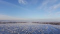 Amazing deep blue sky with cirrus feather-shaped clouds over dry grassland - nature background. Cirrus clouds over the