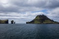 Amazing dramatic view of Drangarnir, Faroe Islands, Denmark north atlantic ocean, best destination for hiking