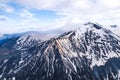 amazing drone shot of magnificent Caucasus mountains, Stepantsminda, Georgia.